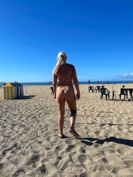 mature beach pornographic image