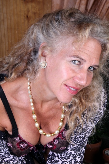 mature undressing hot pics