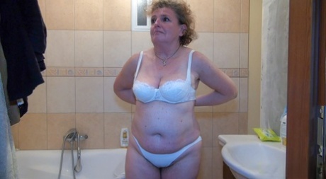 granny undressing pornographic photo